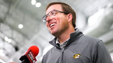 Missouri Tigers head coach Eliah Drinkwitz laughs during an interview post press conference on April 26, 2024 inside Stephens Indoor Facility in Columbia, Mo.