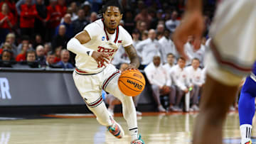 Mar 22, 2025; Wichita, KS, USA; Texas Tech Red Raiders guard Elijah Hawkins (3) dribbles the ball against the Drake Bulldogs during the first half at Intrust Bank Arena. Mandatory Credit: Nick Tre. Smith-Imagn Images