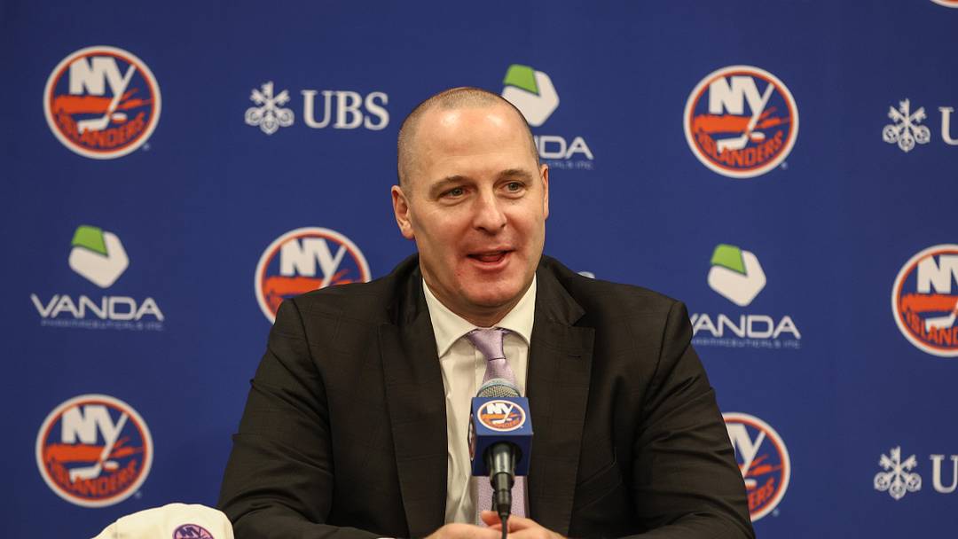Nov 22, 2025; Elmont, New York, USA; New York Islanders General Manager Mathieu Darche speaks with fans at a pre-game event prior to the game against the St. Louis Blues at UBS Arena. Mandatory Credit: Wendell Cruz-Imagn Images