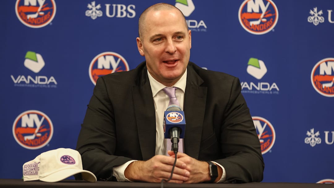 Nov 22, 2025; Elmont, New York, USA; New York Islanders General Manager Mathieu Darche speaks with fans at a pre-game event prior to the game against the St. Louis Blues at UBS Arena. Mandatory Credit: Wendell Cruz-Imagn Images