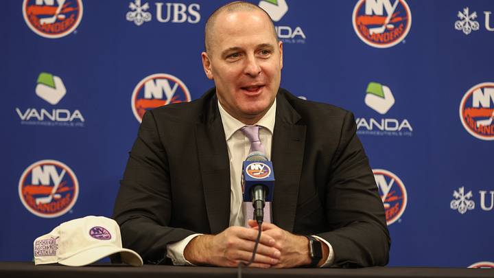 Nov 22, 2025; Elmont, New York, USA; New York Islanders General Manager Mathieu Darche speaks with fans at a pre-game event prior to the game against the St. Louis Blues at UBS Arena. Mandatory Credit: Wendell Cruz-Imagn Images