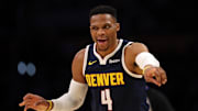 Nov 23, 2024; Los Angeles, California, USA;  Denver Nuggets guard Russell Westbrook (4) reacts to a play during the third quarter against the Los Angeles Lakers at Crypto.com Arena. Mandatory Credit: Kiyoshi Mio-Imagn Images