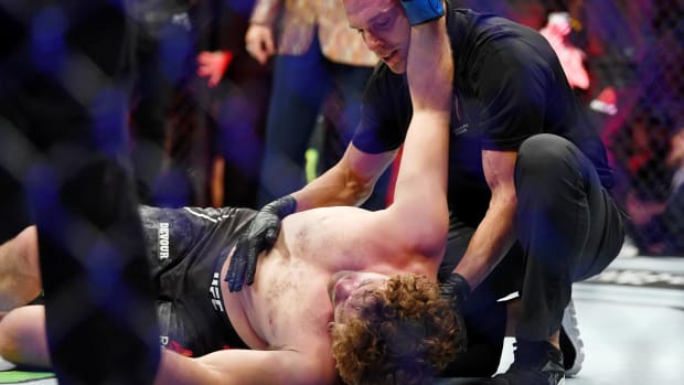 Ben Askren knocked out cold by Jorge Masvidal at UFC 251.