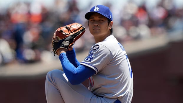 Los Angeles Dodgers starting pitcher Shohei Ohtani (17) throws a pitch against the San Francisco Giants.