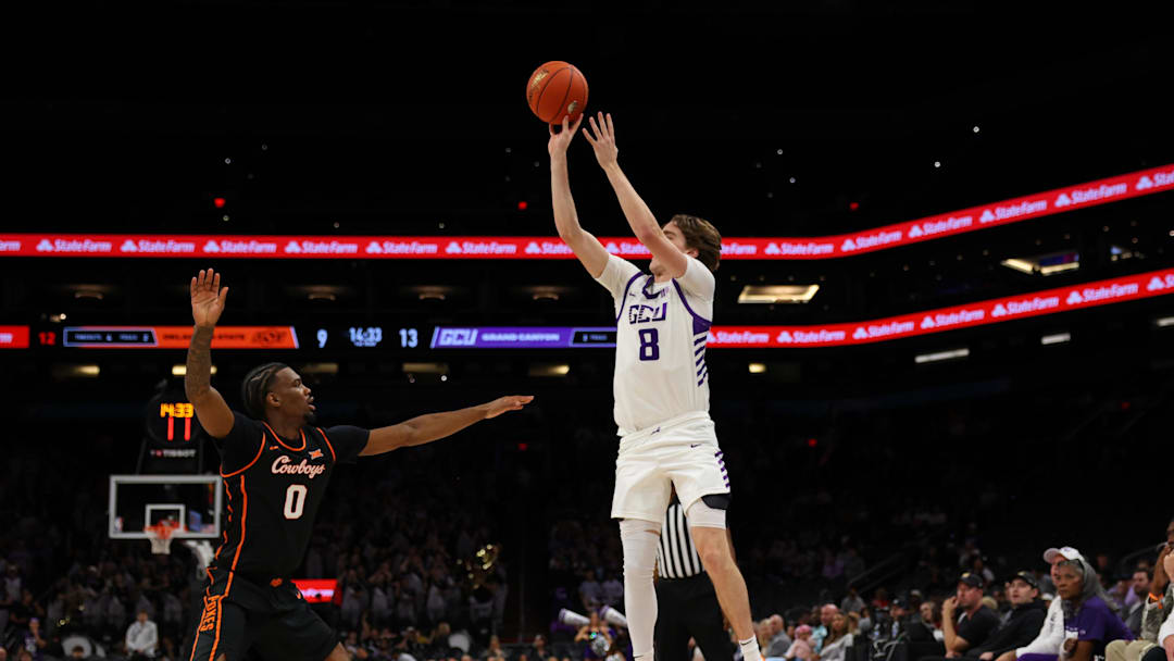 Dec 6, 2025; Phoenix, Arizona, USA; Grand Canyon University Antelopes guard Dusty Stromer (8) attempts a 3-point shot against the Oklahoma State Cowboys during the first half at PHX Arena. Dec 6, 2025; Phoenix, Arizona, USA; Grand Canyon University Antelopes guard Dusty Stromer (8) attempts a 3-point shot against the Oklahoma State Cowboys during the first half at PHX Arena.