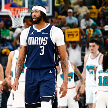 Dallas Mavericks forward Anthony Davis walks toward the bench during a time out against the Memphis Grizzlies