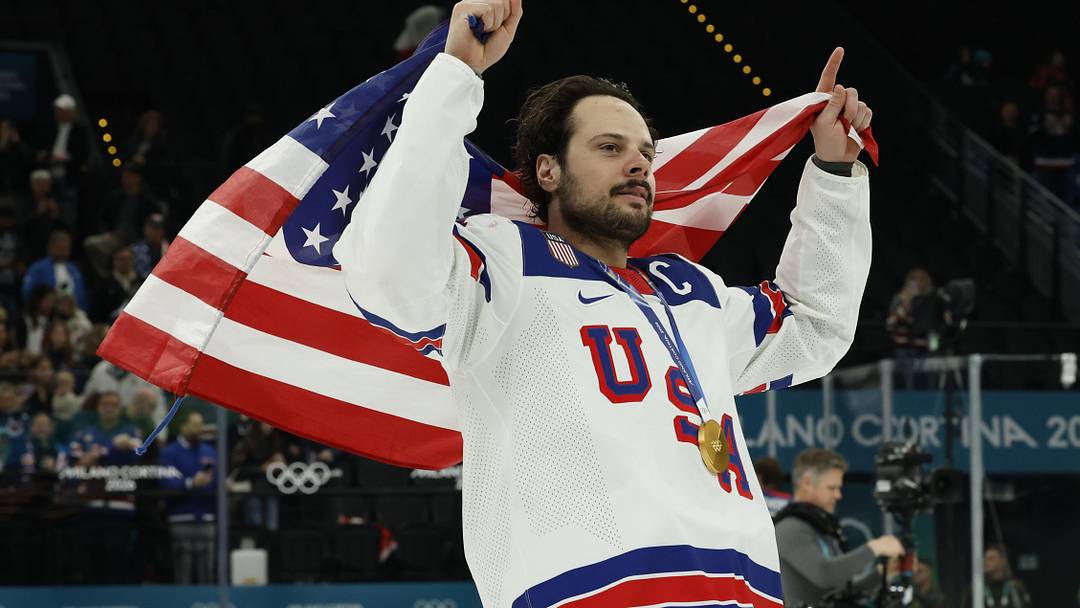 Feb 22, 2026; Milan, Italy; Auston Matthews #34 of Team United States celebrates after the game against Team Canada during the Milano Cortina 2026 Olympic Winter Games at Milano Santagiulia Ice Hockey Arena. Mandatory Credit: Geoff Burke-Imagn Images