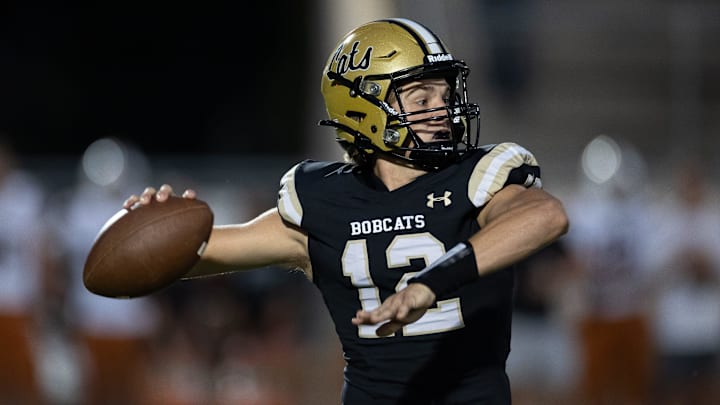 Buchholz Bobcats quarterback Trace Johnson (12) throws the ball against the Tocoi Creek Toros during the first half at Citizens Field in Gainesville, FL on Monday, October 14, 2024. [Matt Pendleton/Gainesville Sun]
