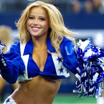 Sep 15, 2024; Arlington, Texas, USA; Dallas Cowboys cheerleader performs during the second half against the New Orleans Saints at AT&T Stadium. 