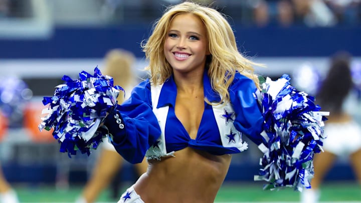 Sep 15, 2024; Arlington, Texas, USA; Dallas Cowboys cheerleader performs during the second half against the New Orleans Saints at AT&T Stadium. 