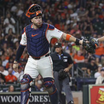 Aug 31, 2024; Houston, Texas, USA; Houston Astros starting pitcher Yusei Kikuchi (16) reacts with catcher Victor Caratini (17) during the sixth inning against the Kansas City Royals at Minute Maid Park.