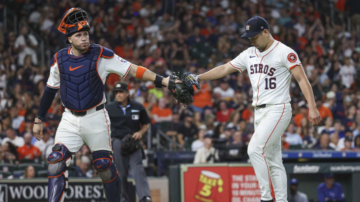 Aug 31, 2024; Houston, Texas, USA; Houston Astros starting pitcher Yusei Kikuchi (16) reacts with catcher Victor Caratini (17) during the sixth inning against the Kansas City Royals at Minute Maid Park.