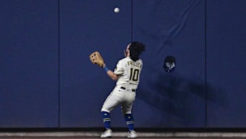 Oct 13, 2025; Milwaukee, Wisconsin, USA; Milwaukee Brewers center fielder Sal Frelick (10) fields a ball off the wall hit by Los Angeles Dodgers third baseman Max Muncy (13) during the fourth inning during game one of the NLCS round for the 2025 MLB playoffs at American Family Field. Mandatory Credit: Benny Sieu-Imagn Images