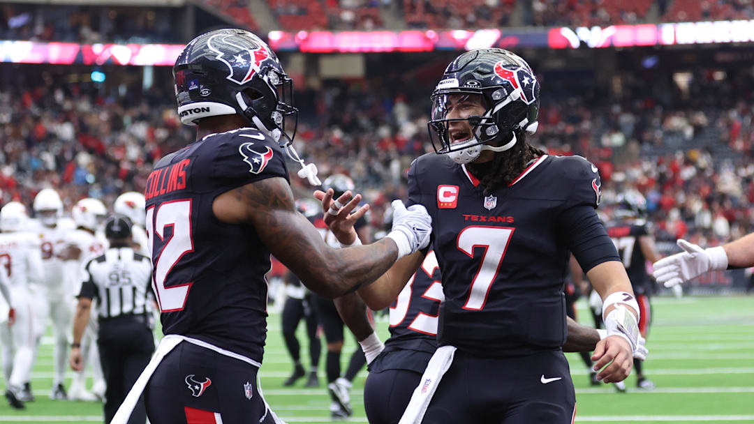 Dec 14, 2025; Houston, Texas, USA; Houston Texans wide receiver Nico Collins (12) and quarterback C.J. Stroud (7) celebrate a touchdown during the fourth quarter against the Arizona Cardinals at NRG Stadium. Mandatory Credit: Troy Taormina-Imagn Images