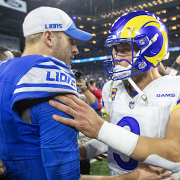 Detroit Lions quarterback Jared Goff (16) and Los Angeles Rams quarterback Matthew Stafford (9) greet each other 