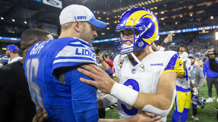 Detroit Lions quarterback Jared Goff (16) and Los Angeles Rams quarterback Matthew Stafford (9) greet each other 