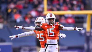 Dec 28, 2023; Bronx, NY, USA; Miami Hurricanes defensive back Markeith Williams (15) and defensive back Jadais Richard (25) react to a missed field goal by Rutgers Scarlet Knights during the second quarter at Yankee Stadium. Mandatory Credit: Mark Smith-USA TODAY Sports