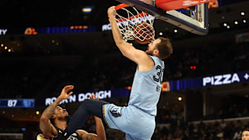 Dec 13, 2024; Memphis, Tennessee, USA; Memphis Grizzlies center Jay Huff (30) dunks during the third quarter against the Brooklyn Nets at FedExForum. Mandatory Credit: Petre Thomas-Imagn Images
