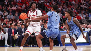 Jan 11, 2025; New York, New York, USA;  St. John's basketball guard Kadary Richmond (1) controls the ball against Villanova Wildcats guard Jhamir Brickus (2) in the second half at Madison Square Garden.
