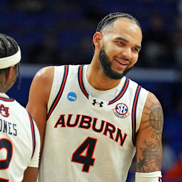 Auburn Tigers forward Johni Broome and Denver Jones lead their team against the Creighton Bluejays on Saturday night.