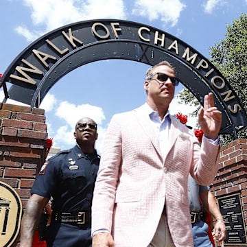 Sep 7, 2024; Oxford, Mississippi, USA; Mississippi Rebels head coach Lane Kiffin makes his makes his way down the Walk of Champions prior to the game against the Middle Tennessee Blue Raiders at Vaught-Hemingway Stadium. Mandatory Credit: Petre Thomas-Imagn Images