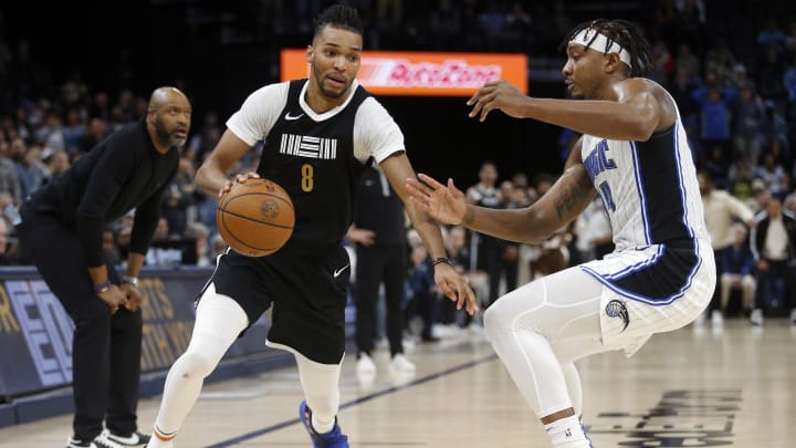 Jan 26, 2024; Memphis, Tennessee, USA; Memphis Grizzlies forward Ziaire Williams (8) moves to the basket as Orlando Magic center Wendell Carter Jr. (34) defends during the second half at FedExForum. Mandatory Credit: Petre Thomas-USA TODAY Sports