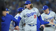 Oct 31, 2025; Toronto, Ontario, CAN; Los Angeles Dodgers pitcher Tyler Glasnow (31) and pitcher Yoshinobu Yamamoto (18) celebrate after defeating the Toronto Blue Jays during game six of the 2025 MLB World Series at Rogers Centre. Mandatory Credit: John E. Sokolowski-Imagn Images