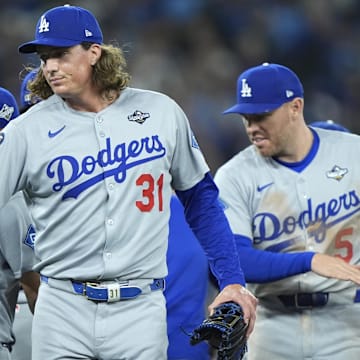 Oct 31, 2025; Toronto, Ontario, CAN; Los Angeles Dodgers pitcher Tyler Glasnow (31) and pitcher Yoshinobu Yamamoto (18) celebrate after defeating the Toronto Blue Jays during game six of the 2025 MLB World Series at Rogers Centre. Mandatory Credit: John E. Sokolowski-Imagn Images