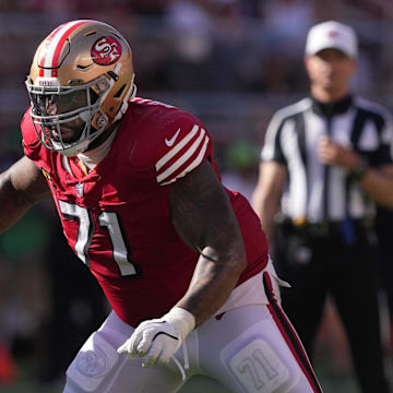 Oct 6, 2024; Santa Clara, California, USA; San Francisco 49ers offensive tackle Trent Williams (71) blocks Arizona Cardinals defensive tackle Naquan Jones (96) during the fourth quarter at Levi's Stadium. Mandatory Credit: Darren Yamashita-Imagn Images