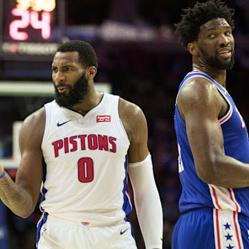 Dec 10, 2018; Philadelphia, PA, USA; Detroit Pistons center Andre Drummond (0) reacts alongside Philadelphia 76ers center Joel Embiid (21) after being called for a foul during the fourth quarter at Wells Fargo Center. Mandatory Credit: Bill Streicher-Imagn Images