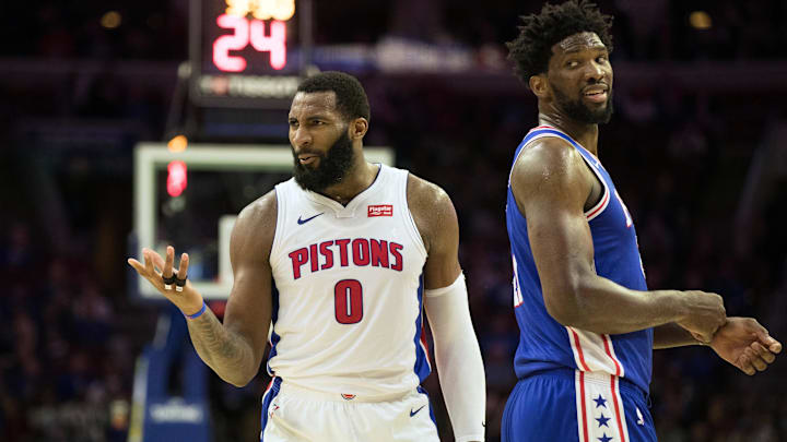 Dec 10, 2018; Philadelphia, PA, USA; Detroit Pistons center Andre Drummond (0) reacts alongside Philadelphia 76ers center Joel Embiid (21) after being called for a foul during the fourth quarter at Wells Fargo Center. Mandatory Credit: Bill Streicher-Imagn Images