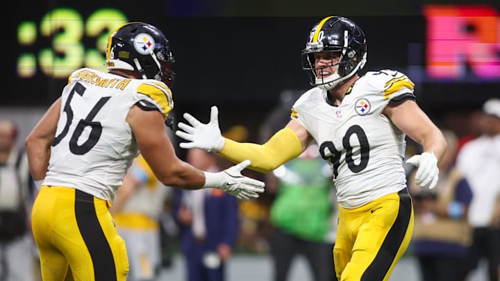 Sep 8, 2024; Atlanta, Georgia, USA; Pittsburgh Steelers linebacker T.J. Watt (90) celebrates with linebacker Alex Highsmith (56) after a sack against the Atlanta Falcons in the fourth quarter at Mercedes-Benz Stadium. Mandatory Credit: Brett Davis-Imagn Images