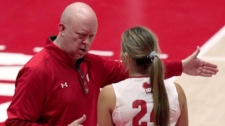 Wisconsin head coach Kelly Sheffield speaks with Charlie Fuerbringer (24) during their volleyball match Tuesday, September 9, 2025 at the Wisconsin Field House in Madison, Wisconsin. Wisconsin beat UW-Milwaukee 3-0.
