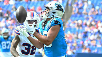 Aug 24, 2024; Orchard Park, New York, USA; Carolina Panthers wide receiver Jalen Coker (18) catches a pass for a touchdown  over Buffalo Bills cornerback Kyron Brown (32) in the fourth quarter pre-season game at Highmark Stadium. Mandatory Credit: Mark Konezny-Imagn Images