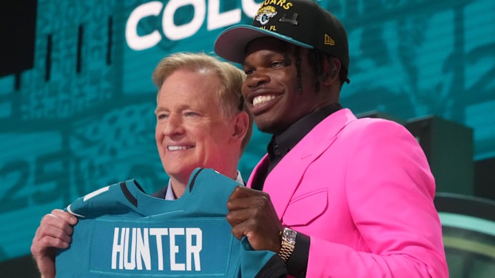 Apr 24, 2025; Green Bay, WI, USA; NFL commissioner Roger Goodell stands with Colorado Buffaloes wide receiver Travis Hunter after he is selected by the Jacksonville Jaguars as the number two pick in the first round of the 2025 NFL Draft at Lambeau Field. Mandatory Credit: Kirby Lee-Imagn Images