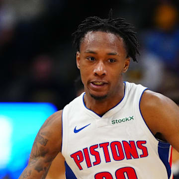 Dec 28, 2024; Denver, Colorado, USA; Detroit Pistons forward Ronald Holland II (00) dribbles up court in the second half against the Denver Nuggets at Ball Arena. Mandatory Credit: Ron Chenoy-Imagn Images