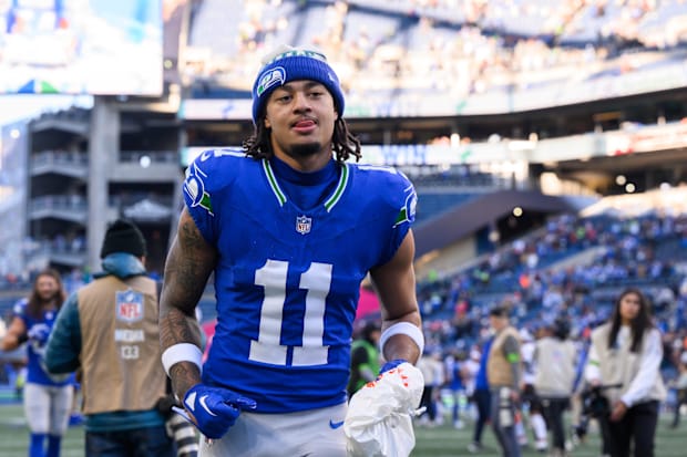 Wide receiver runs off field after win.