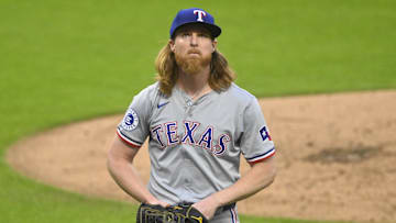 Aug 24, 2024; Cleveland, Ohio, USA; Texas Rangers starting pitcher Jon Gray (22) walks off the mound at the end of the second inning against the Cleveland Guardians at Progressive Field.