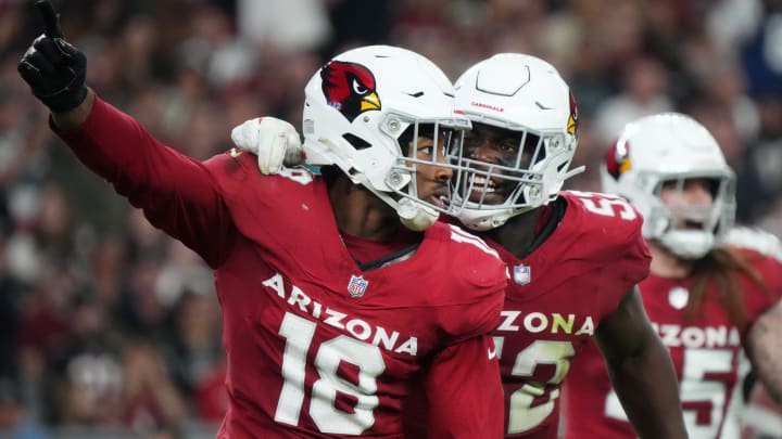 Arizona Cardinals linebacker BJ Ojulari (18) celebrates his defensive stop with teammate Victor Dimukeje during their game against the Atlanta Falcons at State Farm Stadium on Nov. 12, 2023, in Glendale.