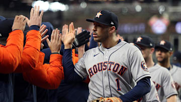 Oct 31, 2021; Atlanta, Georgia, USA; Houston Astros shortstop Carlos Correa (1) celebrates with