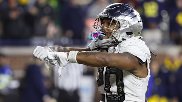 Nov 2, 2024; Ann Arbor, Michigan, USA;  Oregon Ducks running back Jordan James (20) celebrates after scoring a touchdown in t