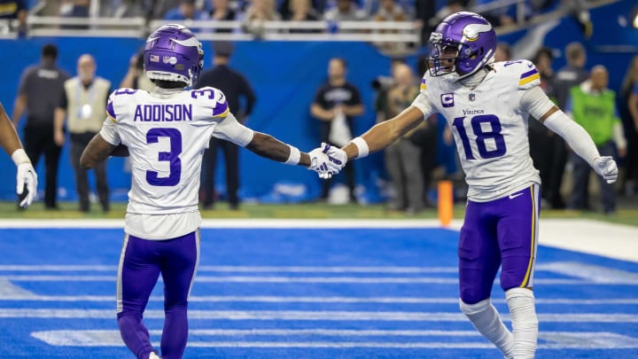 Jan 7, 2024; Detroit, Michigan, USA; Minnesota Vikings wide receiver Jordan Addison (3) catches a pass for a touchdown and celebrates with wide receiver Justin Jefferson (18) during second half of the game against the Detroit Lions at Ford Field. Mandatory Credit: David Reginek-USA TODAY Sports