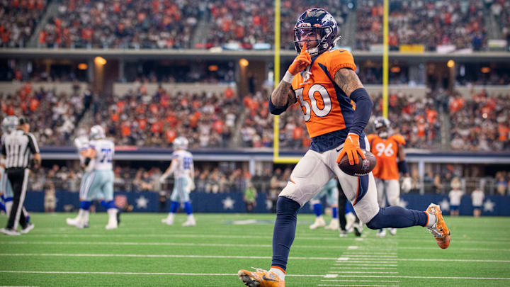 Nov 7, 2021; Arlington, TX; Denver Broncos safety Caden Sterns (30) motions to the Dallas Cowboys fans after he intercepts a pass in the second half. Nov 7, 2021; Arlington, TX; Denver Broncos safety Caden Sterns (30) motions to the Dallas Cowboys fans after he intercepts a pass in the second half.
