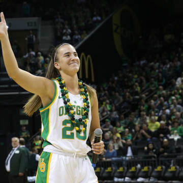 Oregon's Sabrina Ionescu waves to the sold out crowd during the post game program for seniors after the end of the regular season.