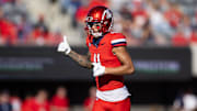 Nov 30, 2024; Tucson, Arizona, USA; Arizona Wildcats wide receiver Tetairoa McMillan (4) against the Arizona State Sun Devils during the Territorial Cup at Arizona Stadium. Mandatory Credit: Mark J. Rebilas-Imagn Images