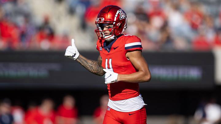 Nov 30, 2024; Tucson, Arizona, USA; Arizona Wildcats wide receiver Tetairoa McMillan (4) against the Arizona State Sun Devils during the Territorial Cup at Arizona Stadium. Mandatory Credit: Mark J. Rebilas-Imagn Images