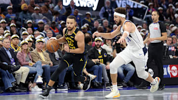 Stephen Curry drives against Klay Thompson during a matchup between the Golden State Warriors and Dallas Mavericks