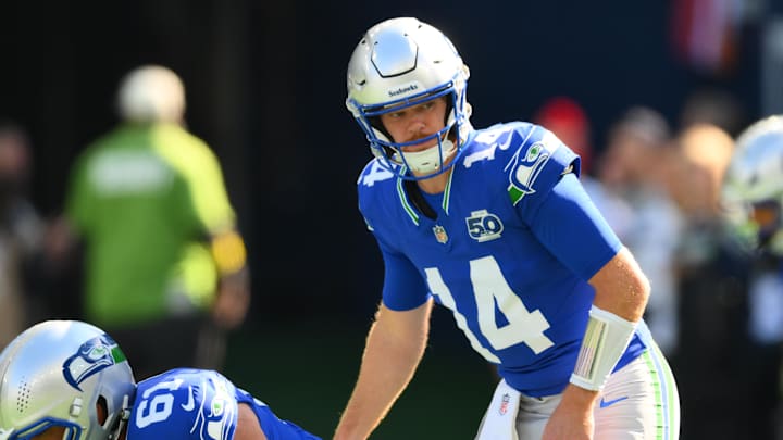 Oct 5, 2025; Seattle, Washington, USA;  Seattle Seahawks quarterback Sam Darnold (14) on the field for warm ups prior to a game against the Tampa Bay Buccaneers at Lumen Field. Mandatory Credit: Steven Bisig-Imagn Images