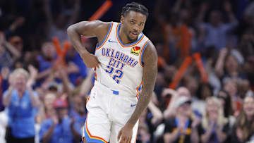 Mar 27, 2025; Oklahoma City, Oklahoma, USA; Oklahoma City Thunder guard Cason Wallace (22) reacts after scoring against the Memphis Grizzlies during the second half at Paycom Center. Mandatory Credit: Alonzo Adams-Imagn Images