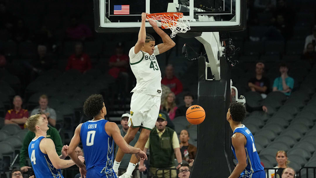 Nov 24, 2025; Las Vegas, Nevada, USA; Baylor Bears guard Cameron Carr (43) follows through on the dunk against the Creighton Bluejays during the second half in a 2025 Players Era Festival group play game at Michelob Ultra Arena. Mandatory Credit: Kirby Lee-Imagn Images